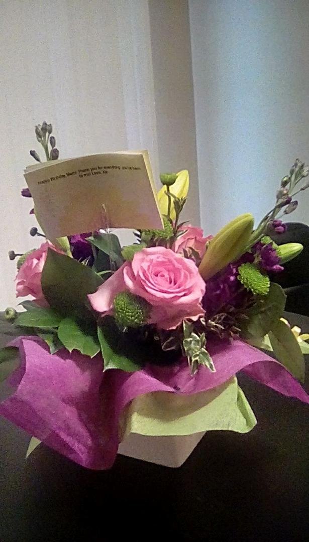 Just the first of my surprises of today, a beautiful arrangement from Xa , always know how to make Mom cry with beautiful flowers, love you baby