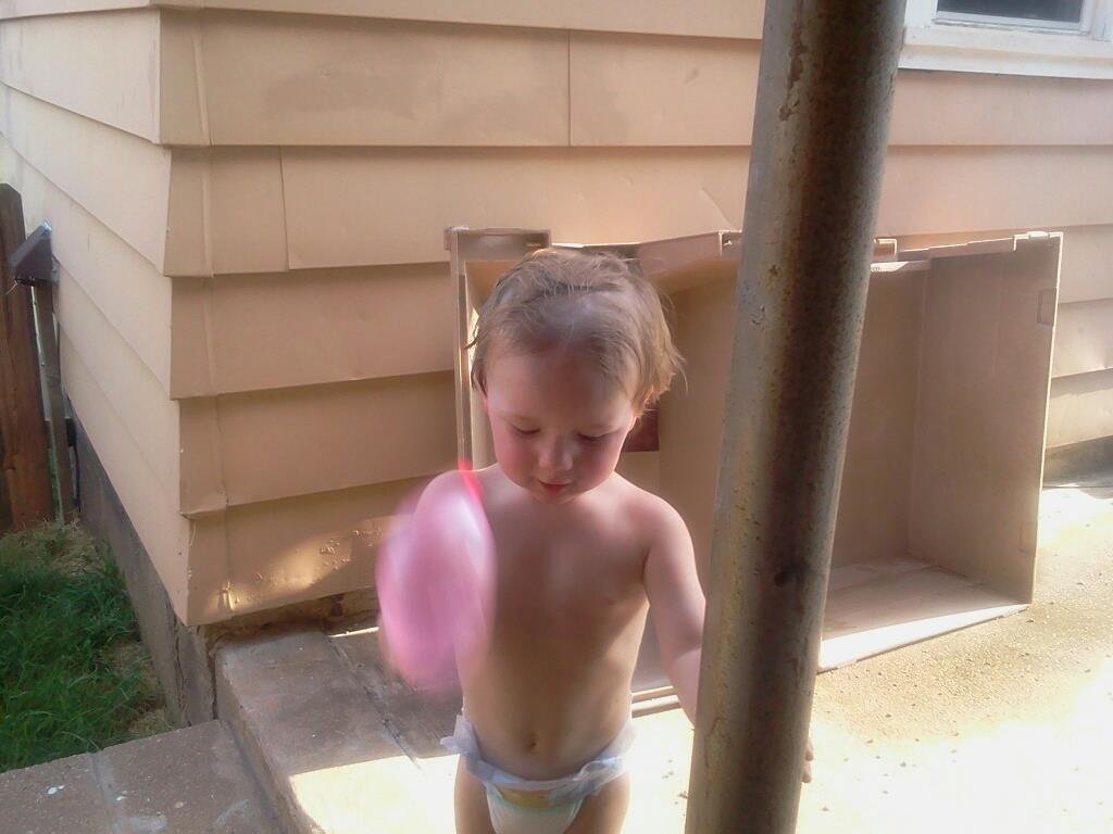 Chasing Auntie with water balloons!