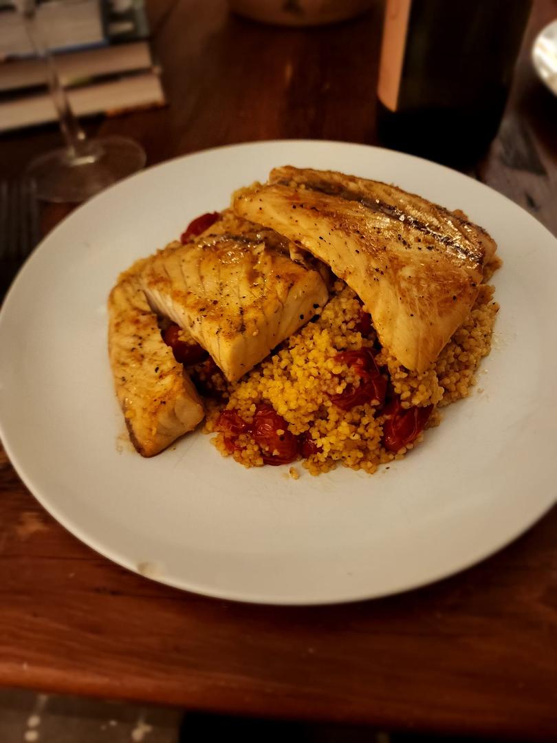Pan seared barramundi with couscous and blistered tomatoes