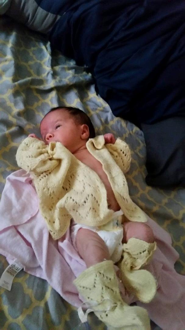 this is Berta's first granddaughter, I made the outfit for Roberta 53 years ago to come home from the host. Now its Marlee's, my great grand daughter.