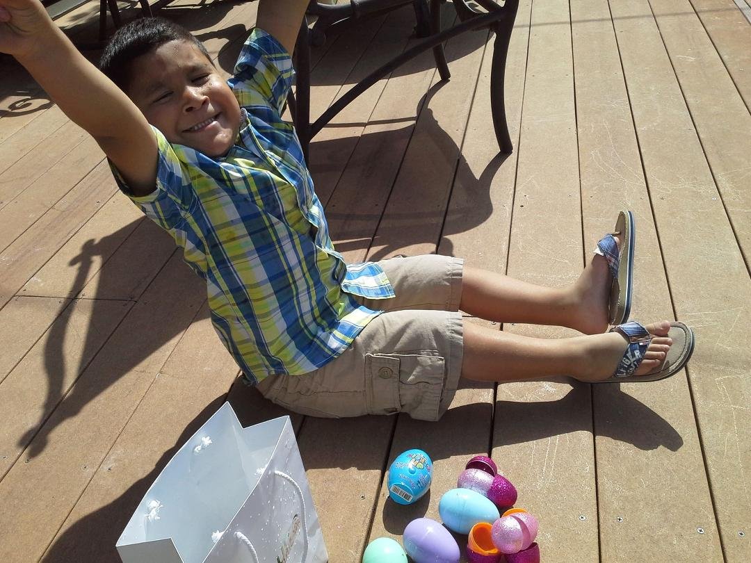 Yeah!!!!!! He scored with goodies at the Easter Egg hunt
