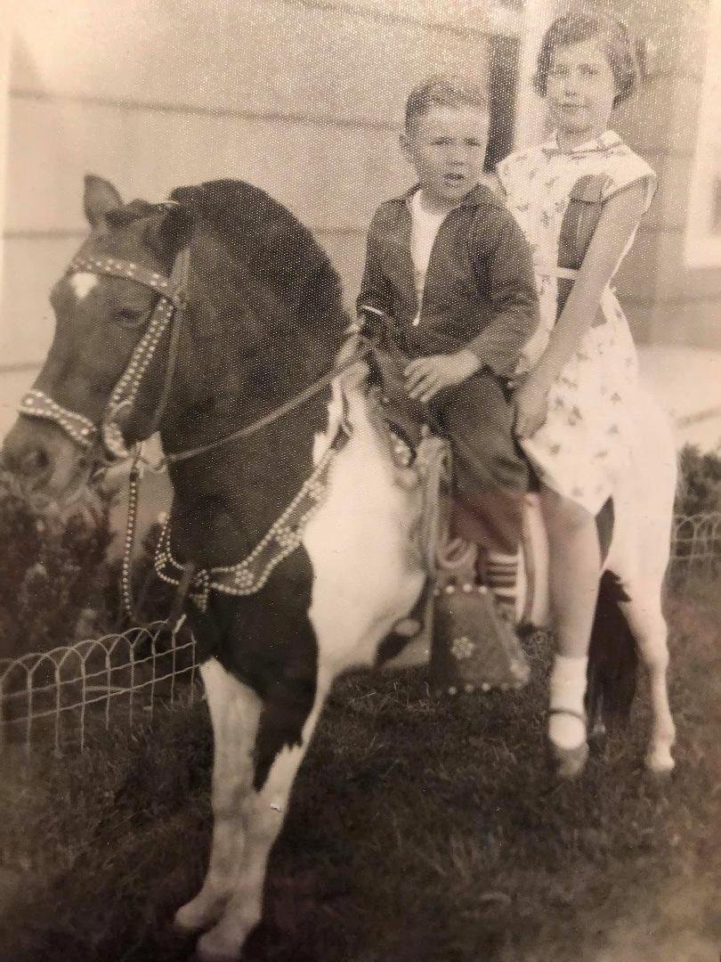 For siblings day. My sister and I on a pony taken in front of our house in Flint, MI long ago.