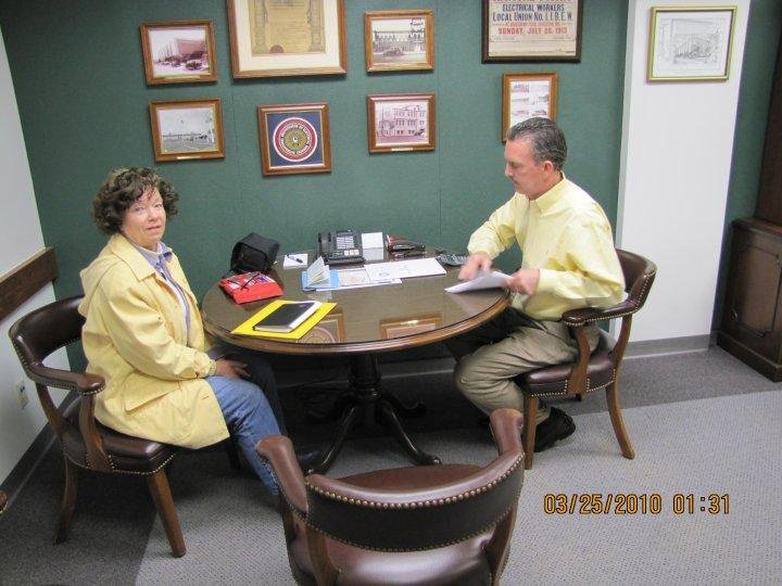 Carole and Dennis getting acquainted as papers are being prepared.