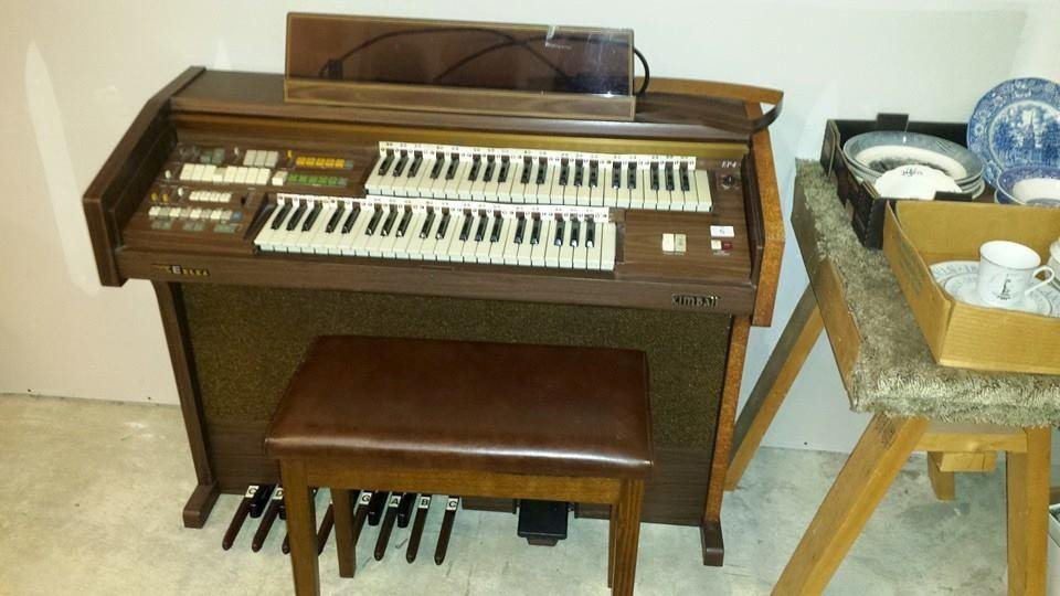 We won this very nice, well kept, fully functional Kimball organ for $1.00!!! That is correct---1 dollar! It cost me $12.00 to have an owner's manual sent to us. We got the owner's manual from, of all places, Marengo, Indi