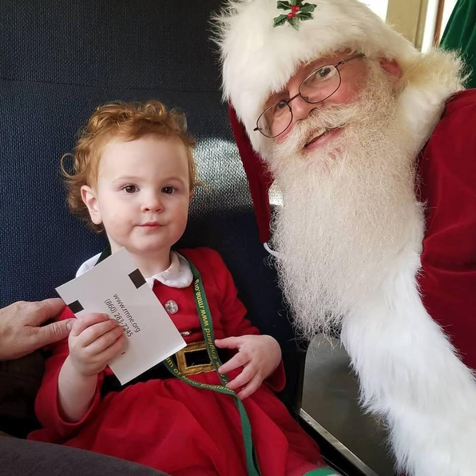 Little Miss Meredith with Santa on the Christmas Train.
