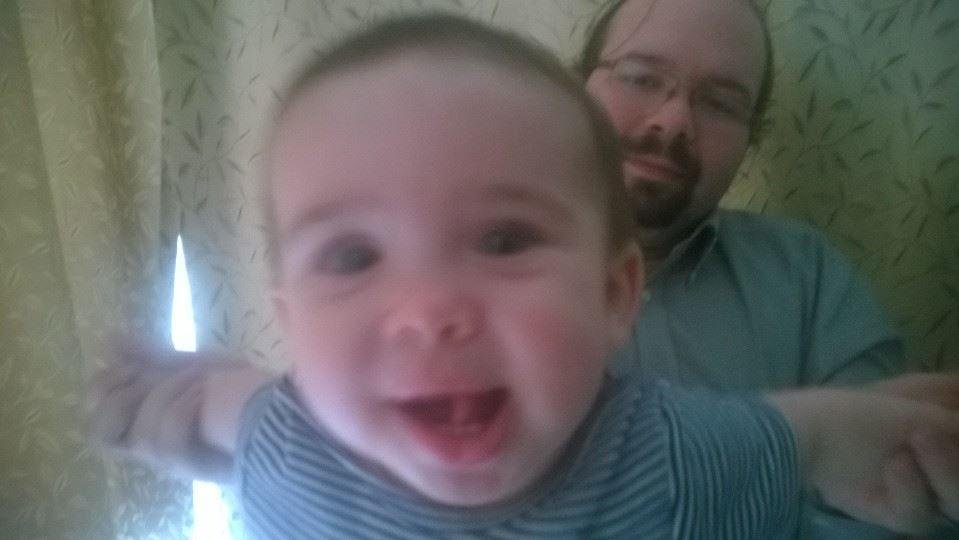 Claire is feeling better with her daddy.