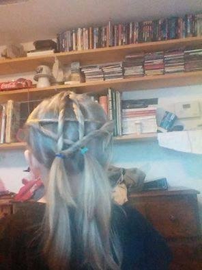 Sage asked for the Star hair and here is my attempt at it. I am thinking about weaving in the glow necklaces to make it shine...lol