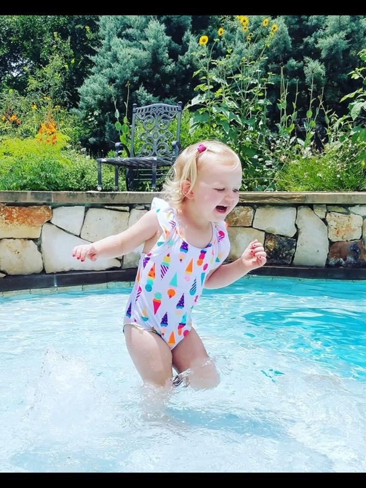 My sweet girl, loving splashing in the water!!