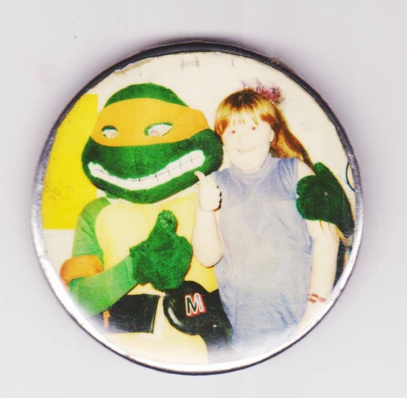 In honor of the most recent Ninja Turtle Movie, make sure you get your picture taken with your favorite Ninja Turtle just like Shurree Clouse did.. (Not sure of the year). CowaBunga Dude!