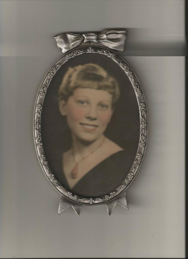 Here is another picture of my Mother on her remembrance day. There is no writing on the back of the picture, but it says LaSalle & Koch Company on the back. This would either be her Senior High School picture or the pictu