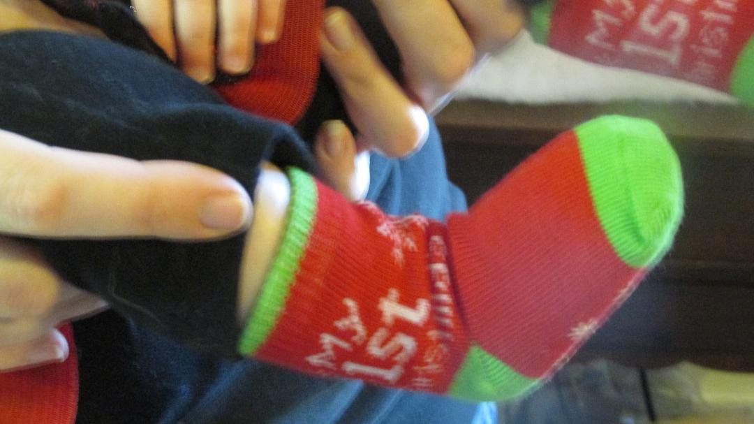 Gramma Carol heres my socks thanks from Ella