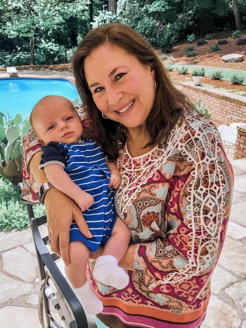 Debi and Henry enjoying a beautiful spring day on the patio.