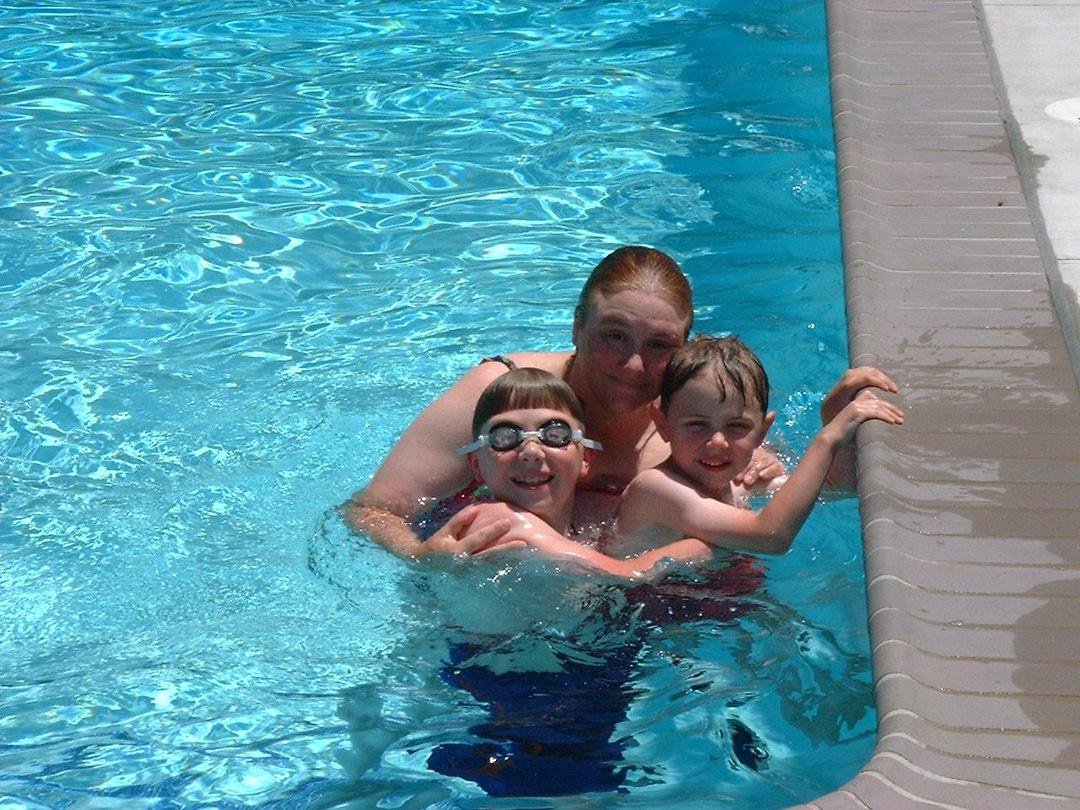 betsy, andrew and curtis at Gram's swimming pool in CA