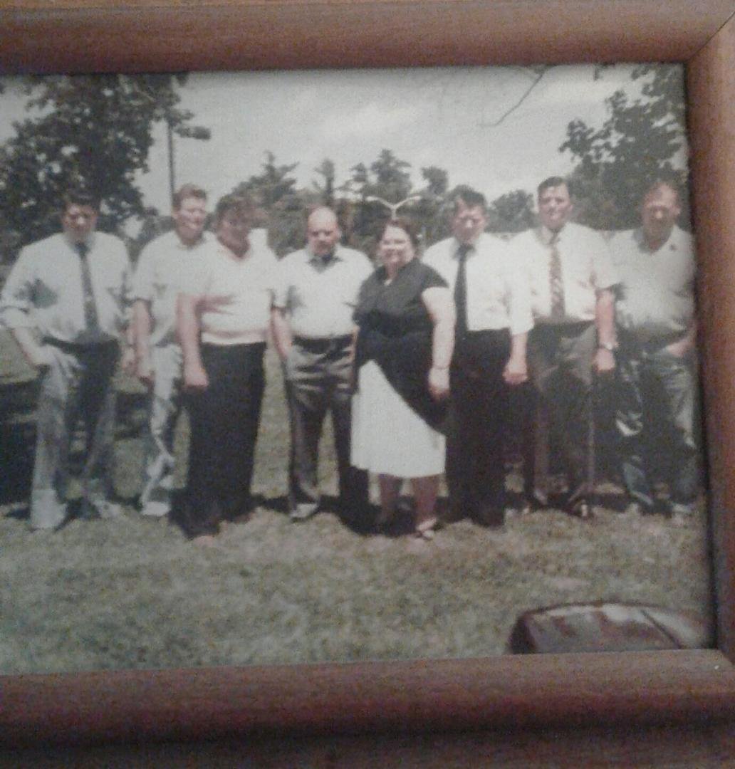 Left to right...Uncle Bill, Uncle EB, Uncle Shorty, Uncle James, Aunt Doris, my dad Tommy, Uncle Donald, and Uncle Calvin. This was taken at grandpa's funeral. All have passed on except Shorty and my dad. When this was take