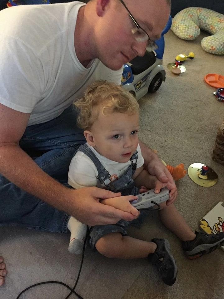 Carter learning to play on dad's old Super NES.