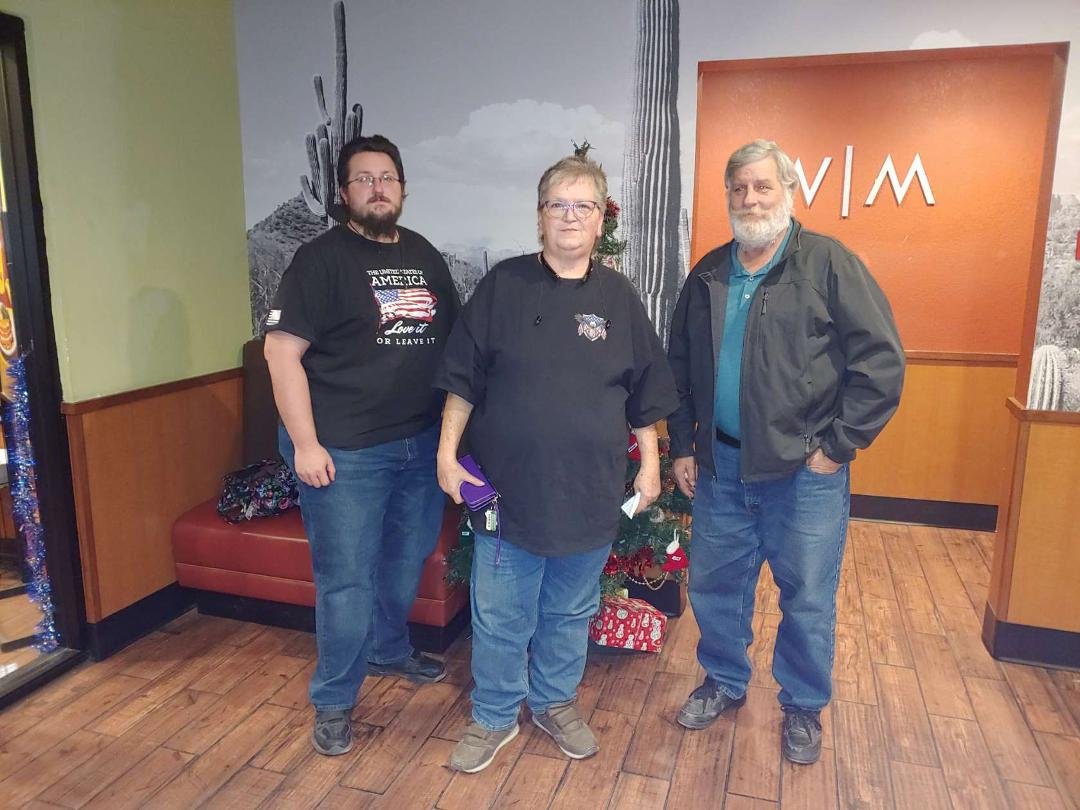 This is my son, Chris Alling, on the left side of the picture and my husband, "Chuck" Charles Alling, on the right. I truly miss him. That was his Santa look when we went to Denny's for Thanksgiving with my sister and her h