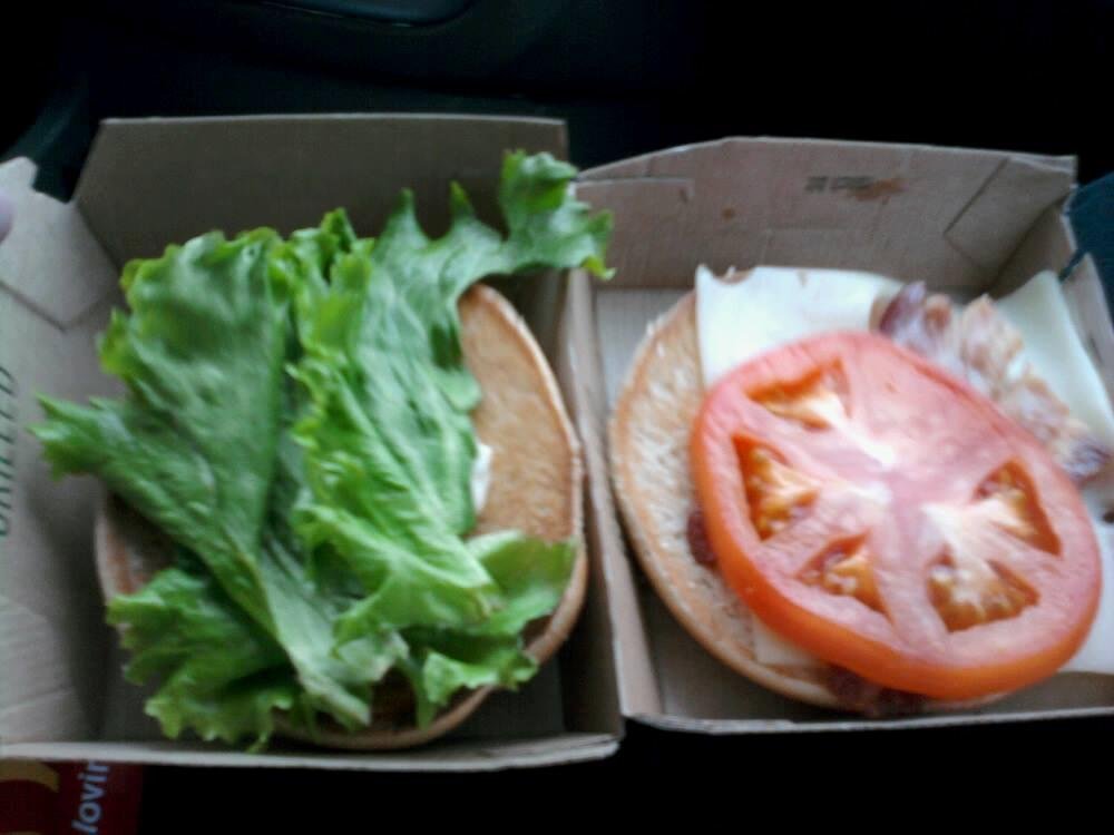 McDonalds in South Lyon... notice anything about our Chicken Club Sandwiches? We got two of them served up this way...