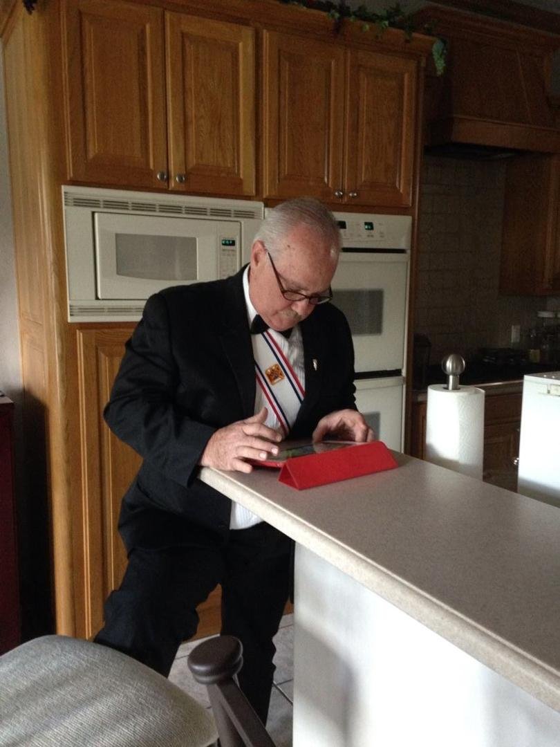 Rick playing his clash of the clan after church