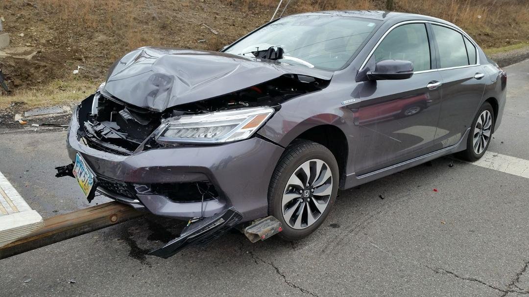 There's what's left of the wife's 2017 Accord after the Honda CRV landed on the hood. Thank God we weren't closer to the intersection or it might have hit on the windshield.