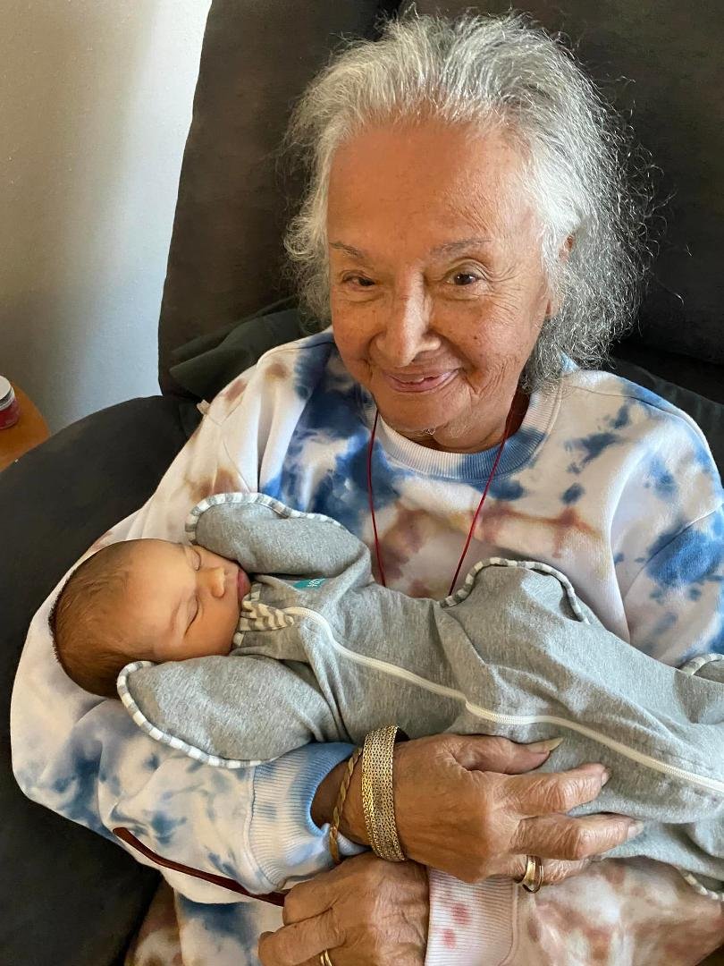 Mercedes Wise holding her new great granddaughter