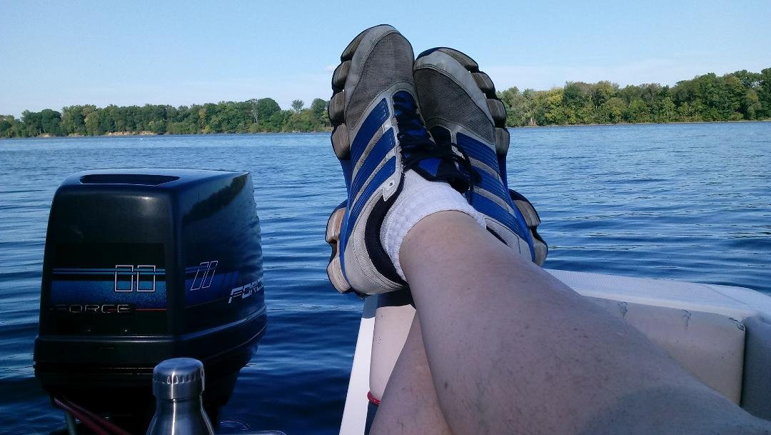 Dirty sneakers and an old outboard..... Yeah, I'm good with that.