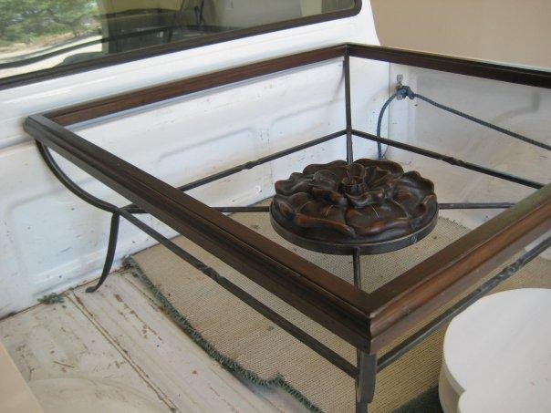 Walnut wood frame with stained and glazed flower in basswood.