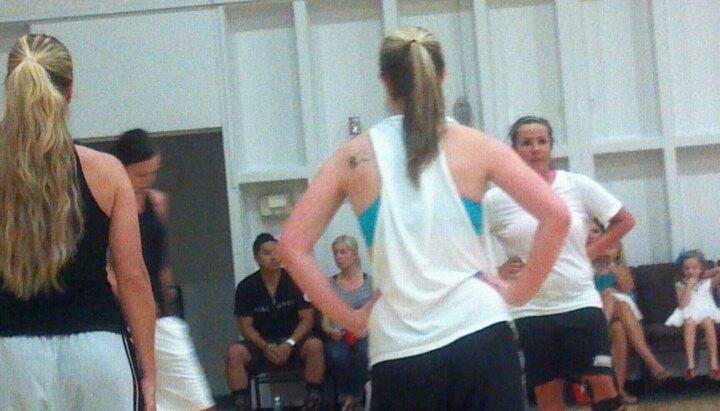 When she plays ball I rarely her a pic of her face! She is the one with her back to the camera.r