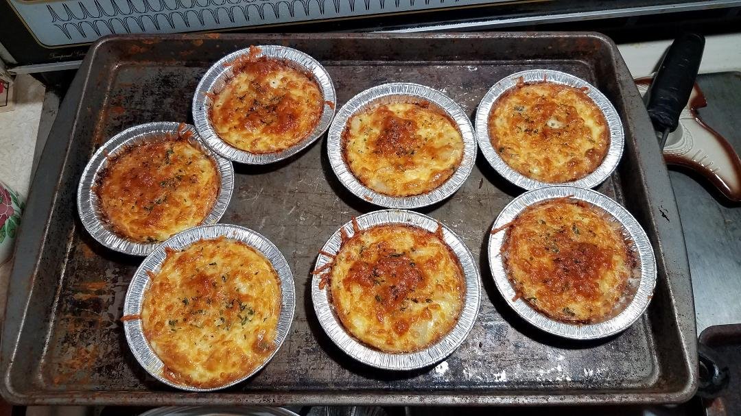 Mini scallop quiches. (No crust, made in those mini apple pie tins) We freeze them, and have them for breakfast. Not hard to make. I used scallop pieces, but had to chop them up more, sauteed in butter. Drained, and the liq