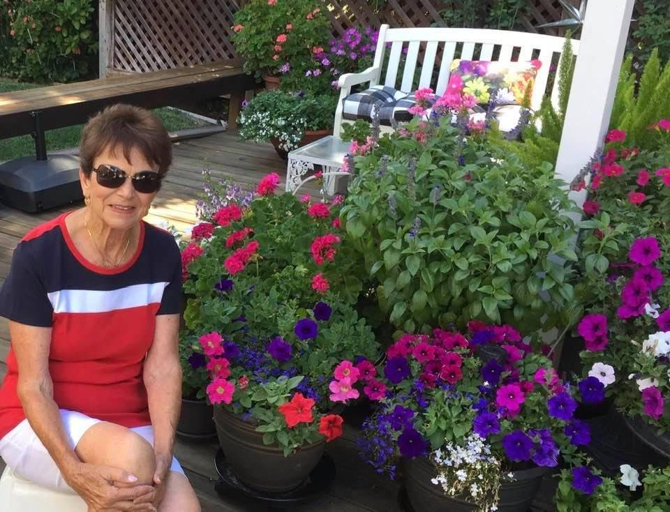 So Dave said he’d like to take a picture of me with my flowers; well you know that saying, “can’t teach an old dog new tricks”. Not inferring Dave is an old dog but took about 40 tries before he got the hang of it.  Thanks 