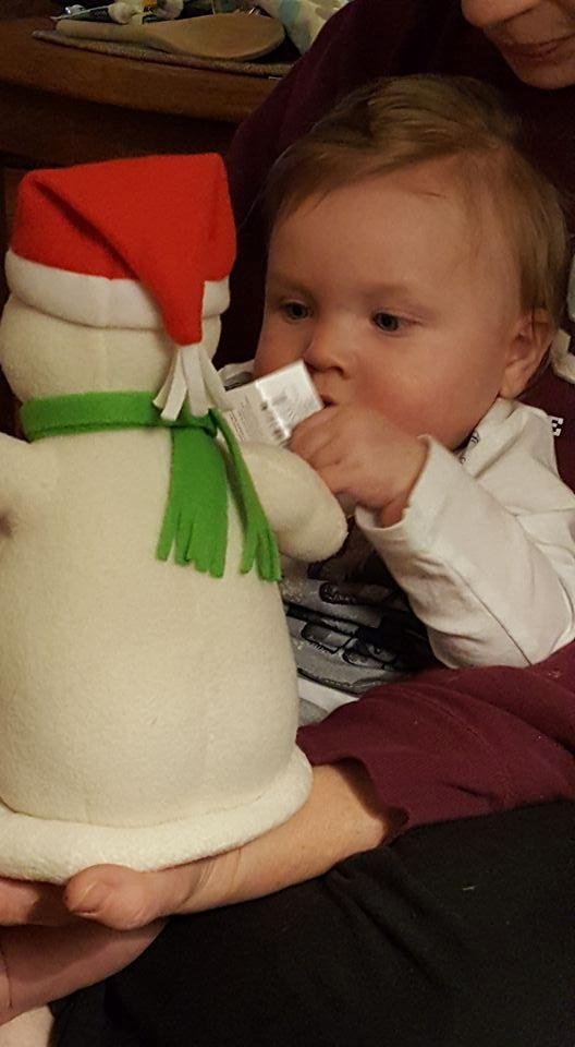 My Nephew Dustin. Looks like he is reading the instructions. LOL