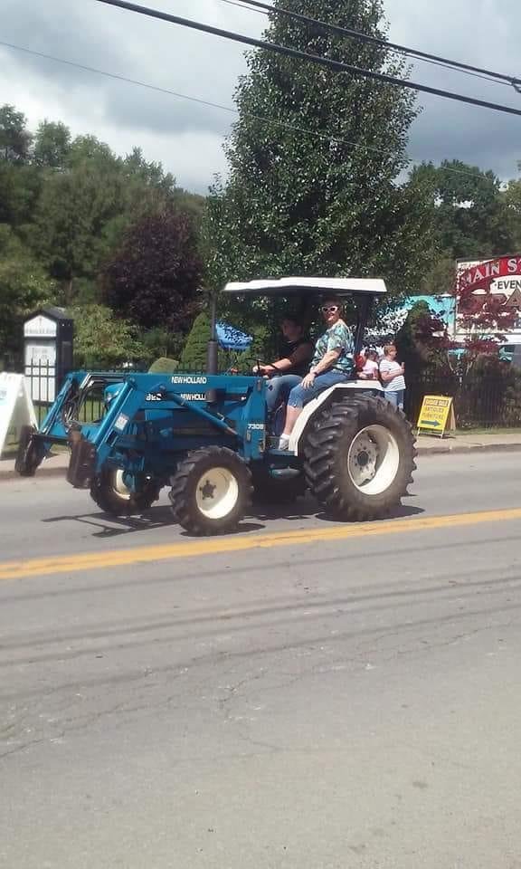 Jeff tractor parade.. My grandson, Brandon, drivin! Had a great time