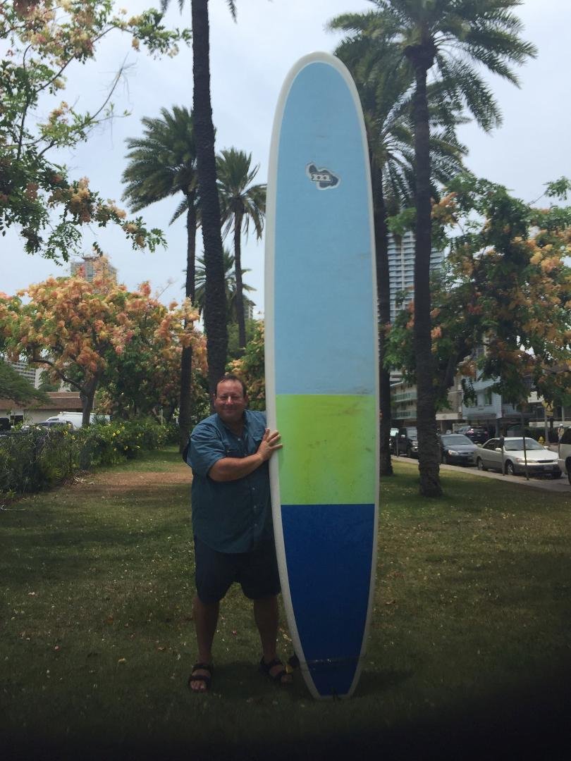 Laird 12 foot surfboard I used for my Waikiki Beach surfing lesson with instructor Jennifer. I did stand up a couple of times before nose diving into the surf and drinking warm ocean water. What fun! Bruce