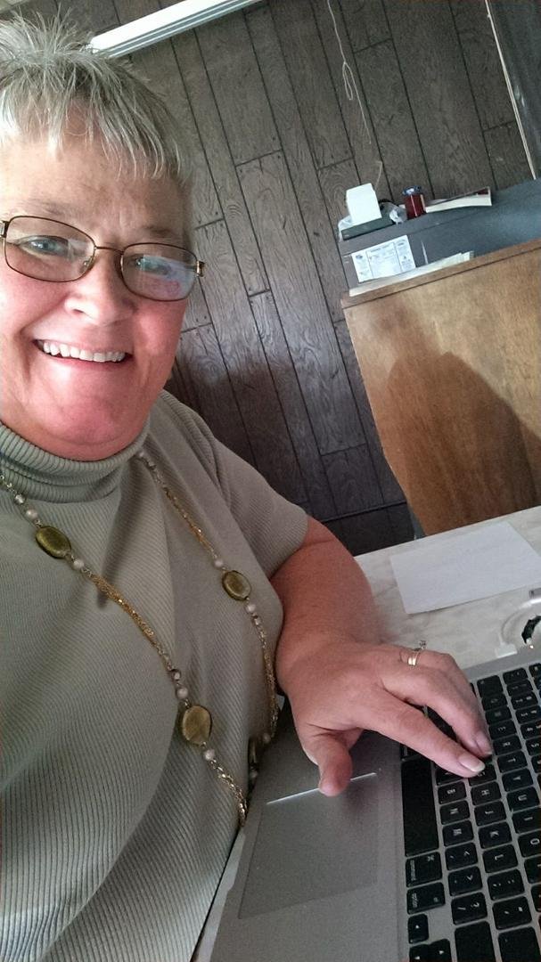 Taking the woman challenge ... doing what I do best (typing).