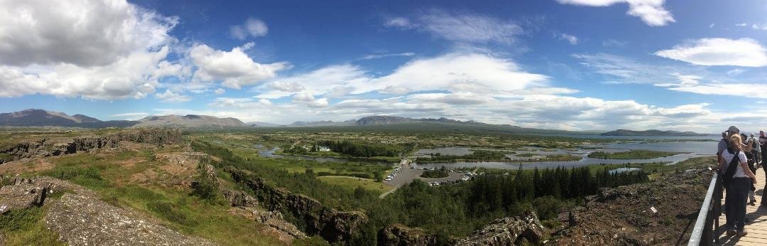 Panoramic photo of Eurasian - North American tectonic plates through Iceland taken from west side. East side of rift is now near the mountains on the horizon. Moving apart about 1" per year.