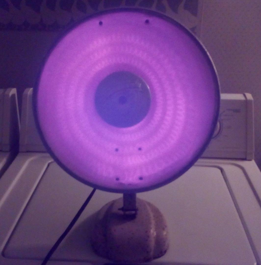 I spent days polishing the reflector. Best I can get it. Old radiant heater, about 48 years old.The guard is off.
I was always fascinated by the reflection of the hot coils.
