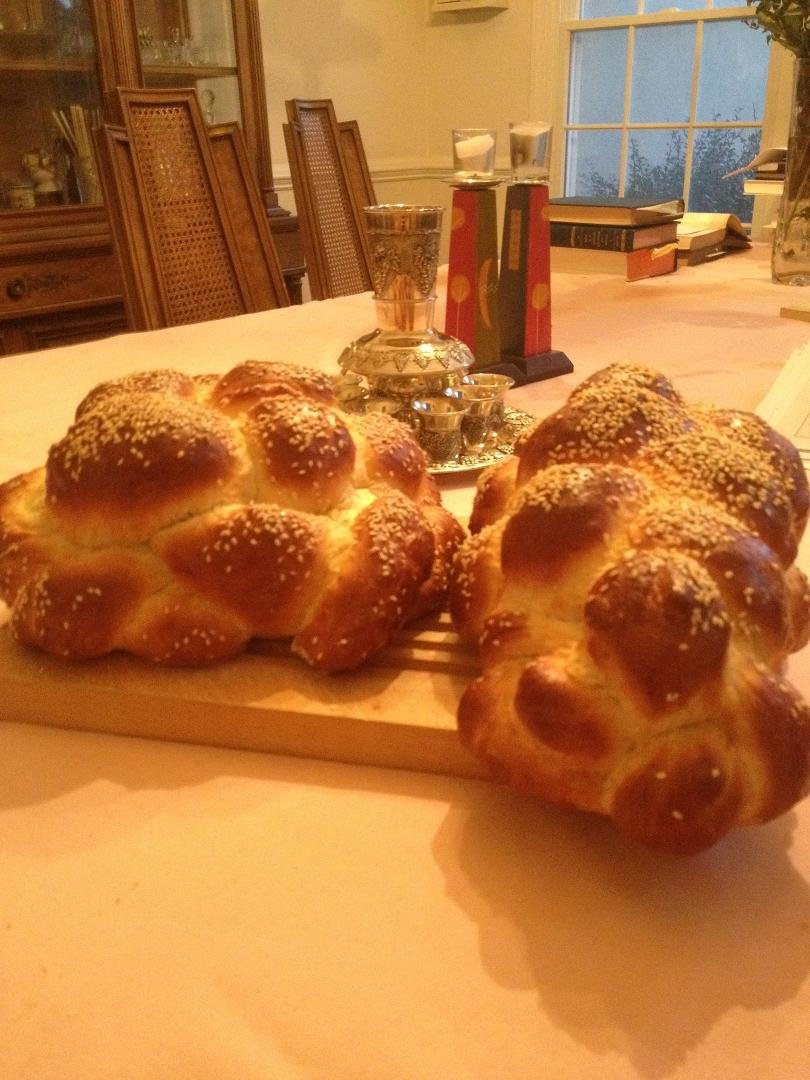 A Sweet New Carb-filled Year to everyone! Happy 5774! Shana Tova! (Gorgeous challahs courtesy of my live-in baker, BDC; one with raisins, one without). Trust me, they taste as wonderful as they look! :)