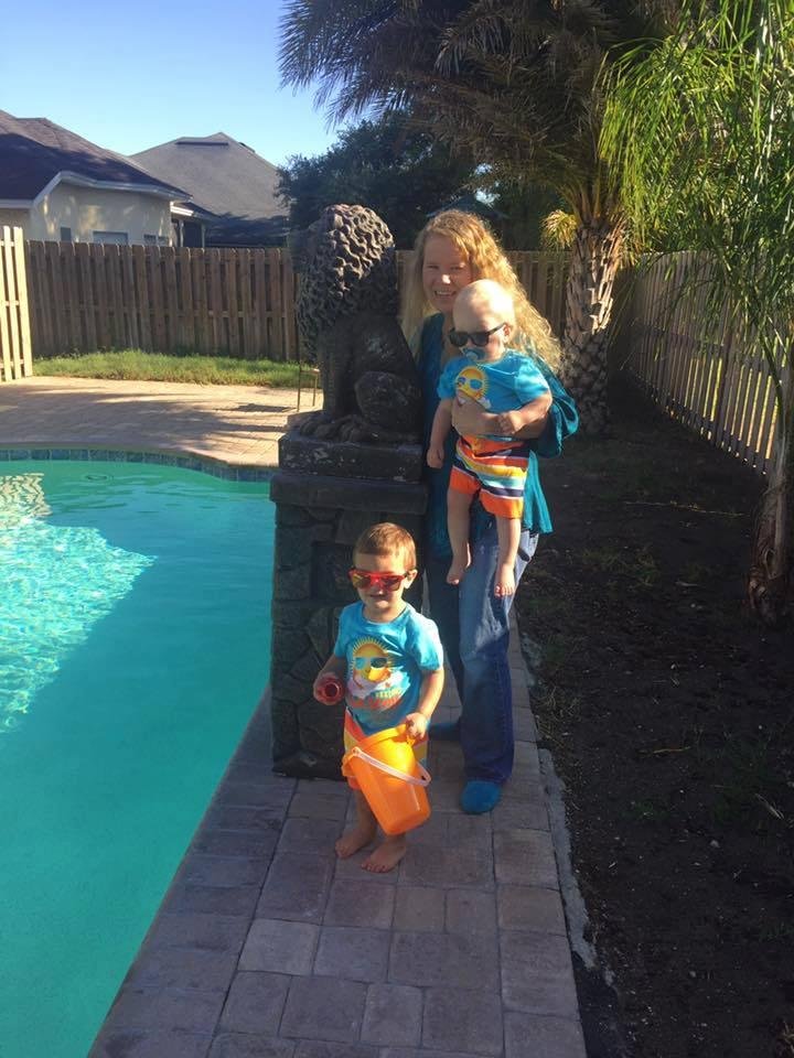 my daughter Natalie with my great-grand-kids.