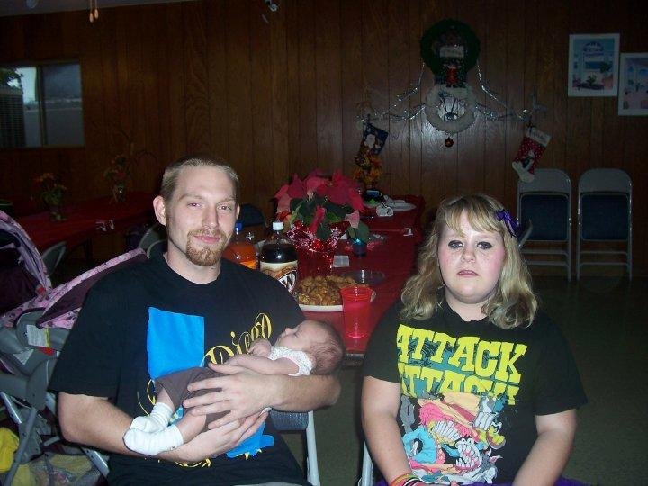 Richard, Heather and Baylee.............Rich very nervous about holding the baby