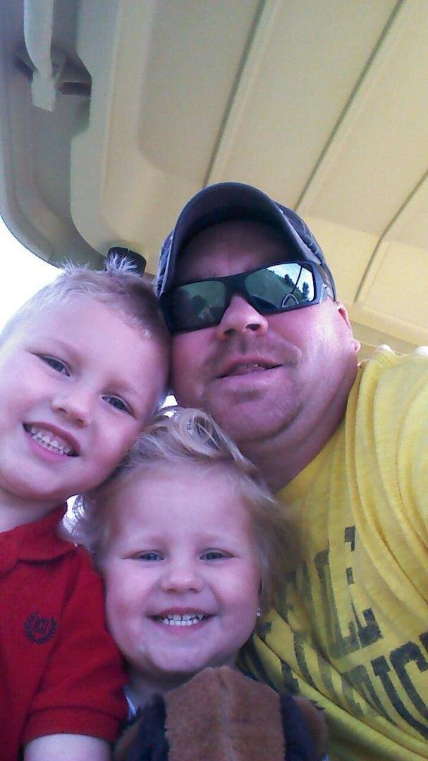 My son Kyle with his son Owen and daughter Natalie