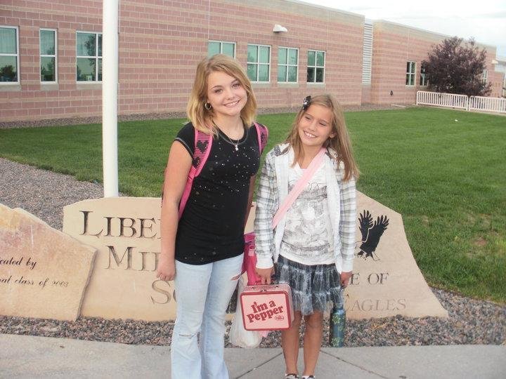 Well there they go, another year in school. Meg was thrilled to have this picture taken with her baby sister in front of the school.