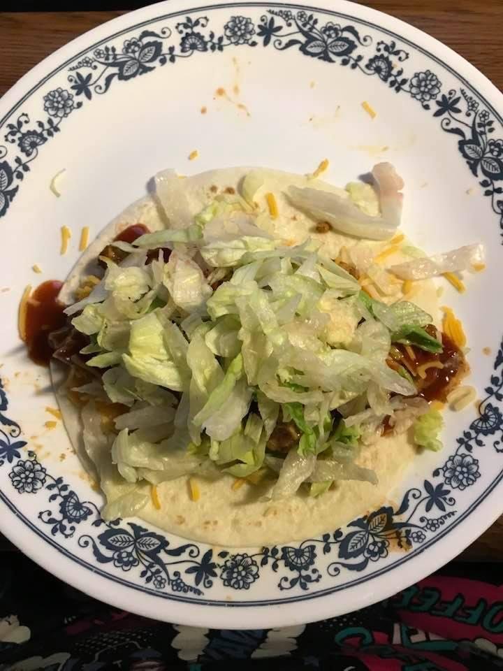 Seasoned chicken, cheese, avocado, lettuce, and Taco Bell medium sauce. YUM 😋