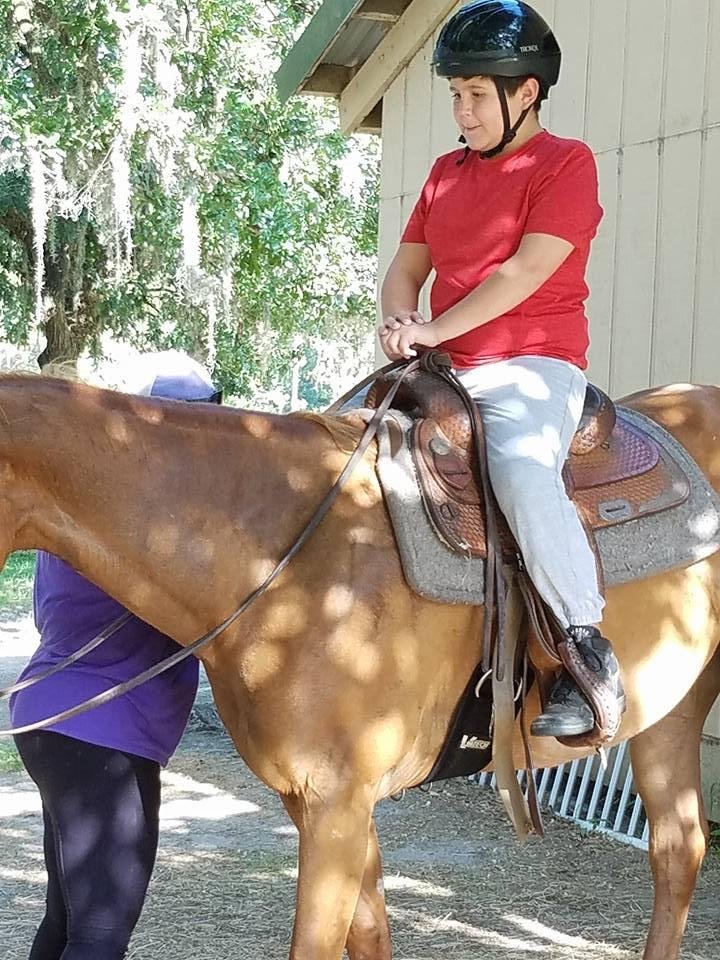 Zac getting instructions for the trail ride.