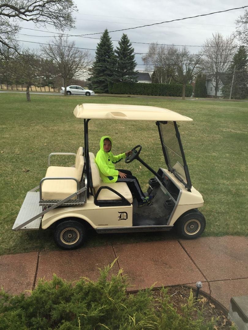 Jayden cruising on the golf cart. Gramps created a monster lol