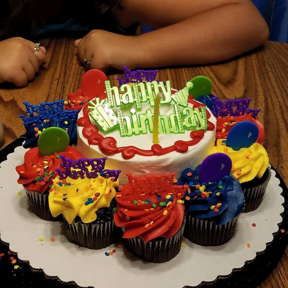 Celebrating my birthday early with my husband, daughter, and granddaughters