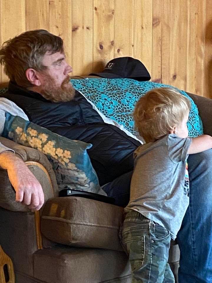 Silas and Justin watching Top Gun Maverick