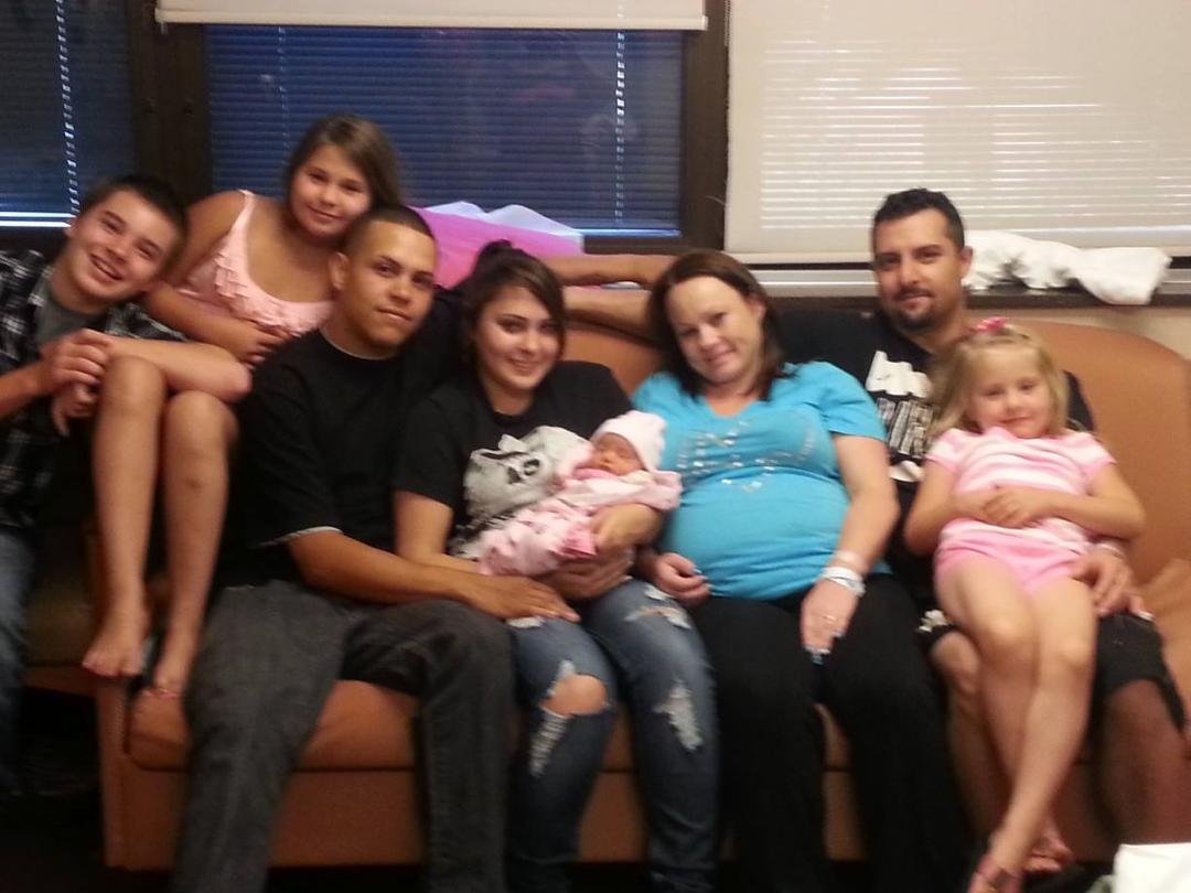 My daughter Myndee her fiance and all 5 of my beautiful grandchildren. The handsome young man in the black belongs to my oldest granddaughter.