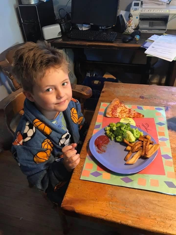 Leftover pizza and french fries and broccoli for breakfast!