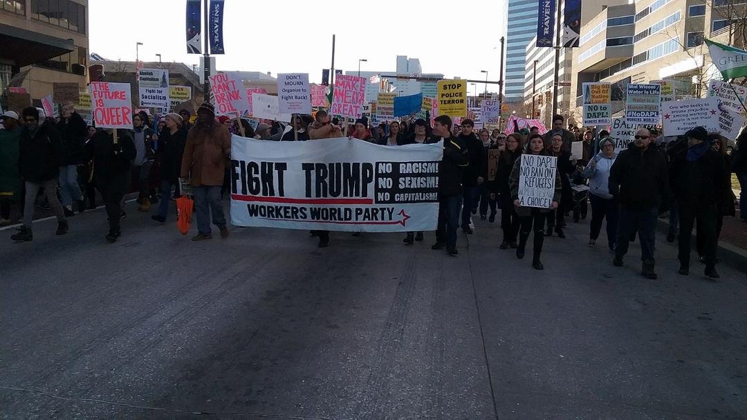 Baltimore Maryland responds to Trump's executive orders. Marching through the streets of downtown and then to the Inner Harbor.