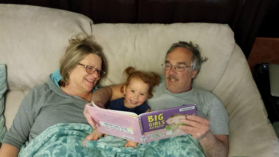 Pop Pop, Aly and Oma reading. Happy!