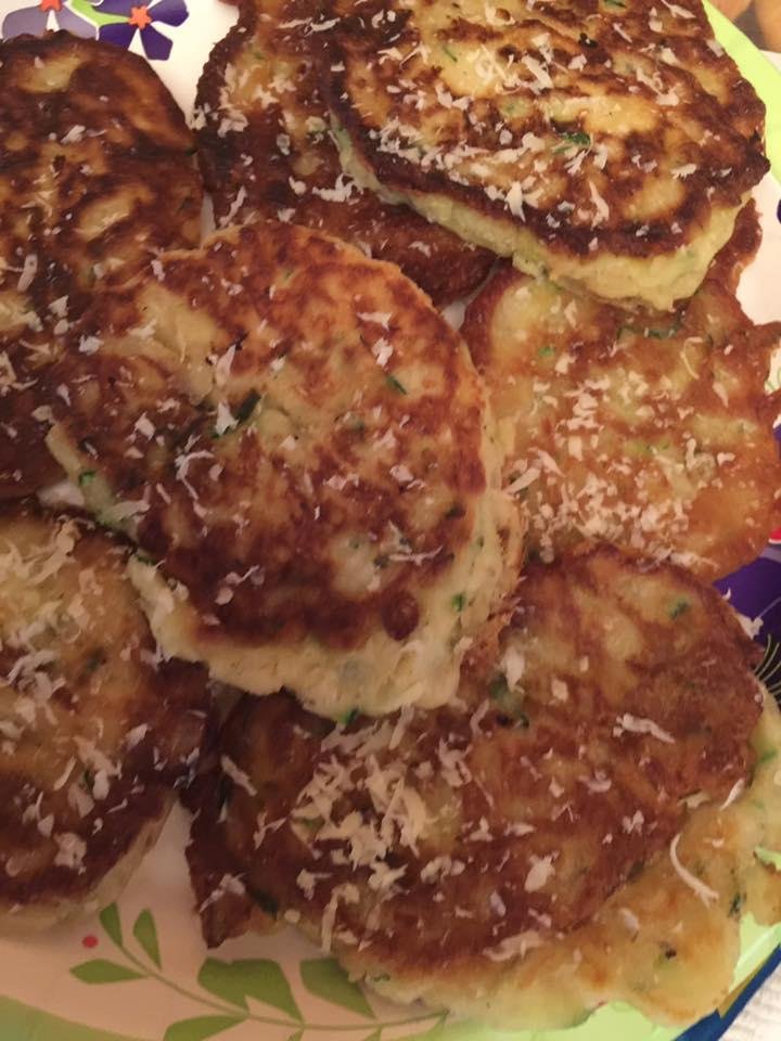 Homemade zucchini pancakes with asiago cheese and sea salt! They are delish...😍